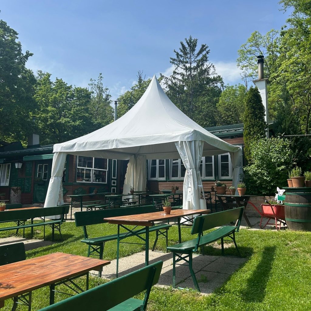 pagoda tent used in garden for dinner party